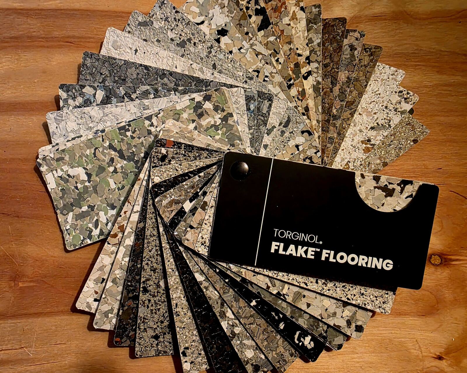 Epoxy flake colour sample fan, showing available flooring finish options