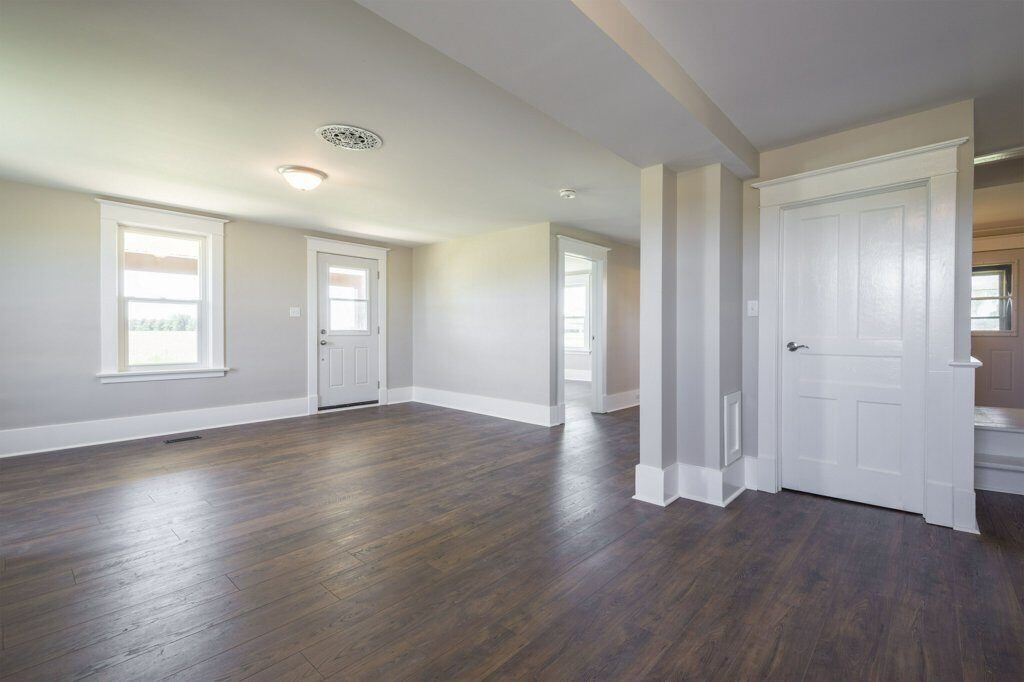 Finished entry hall with fresh paint and trim